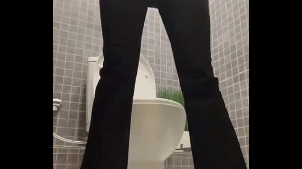 Public Toilet Plug Play In the privacy of a public bathroom, I lower my pants, showcasing my pierced belly butto…