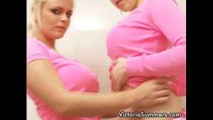 Busty blonde slut playing with her huge tits