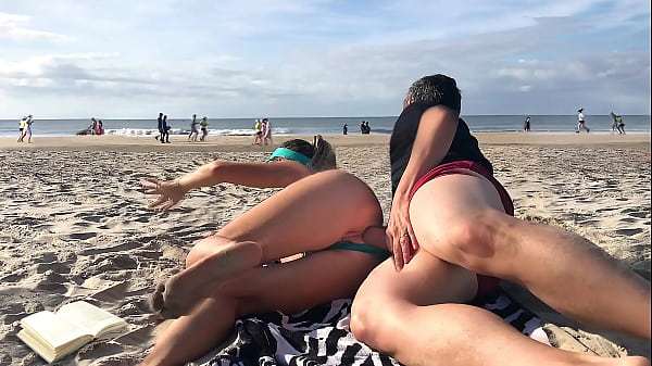 Getting a dick in her ass in front of everyone was the last thing she expected while lying on a public beach…