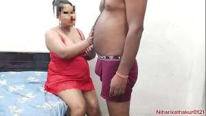 indian couple at honeymoon in hotel