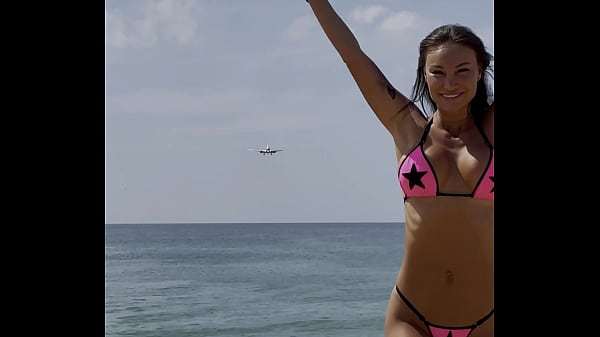 Monika Fox Poses In Pink Bikini With Stars On Beach (Free)