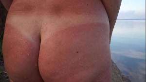 Unstripping on beach of Volga-river