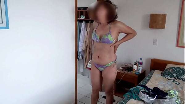 On the beach, very aroused, I masturbate with my stepson and he cums in my pussy