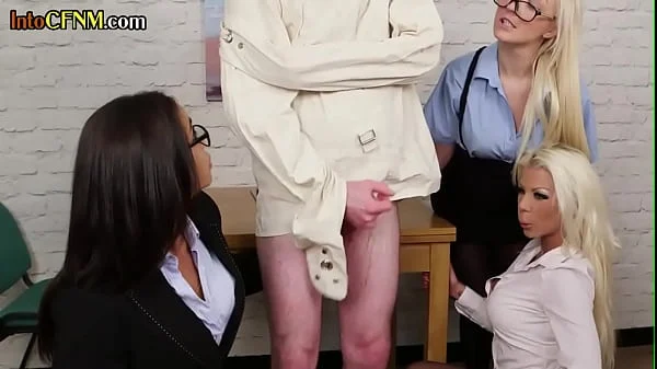 CFNM group of dominas suck and jerk cock of lunatic