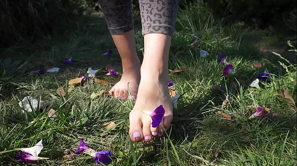 Crushing Flowers Barefoot In The Grass