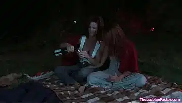 Busty lesbian fucks girlfriend outdoors