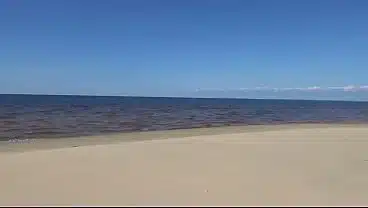 Funny milf with nylon ass and tits on beach