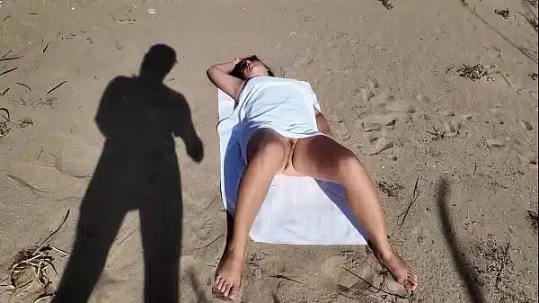 Stranger on a Nudist Beach