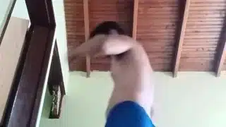 Guy working out bouncing his cock between his shorts ends up naked working out