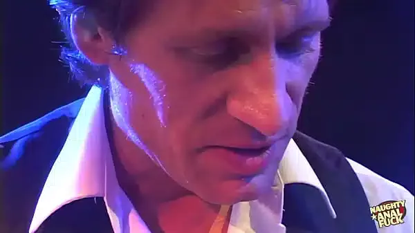 Massage in a smokey room between an old masseur and supple young blonde is missionary.