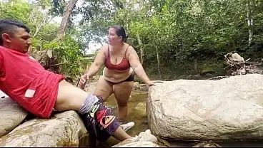 Unknown woman gives me a handjob in a river, fills her breasts with milk