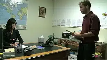 Tense brunette milf with fake boob uses the big cock of her intern in doggy style to orgasm