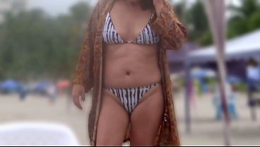 My stepson films me on the beach putting on a bikini, showing off, and even masturbating.