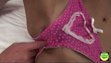 A lusty Asian brunette gets fingered, titty fucked and sprayed with cum over her face
